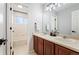 Clean bathroom with double vanity and bathtub at 12826 W Brittany Dr, Littleton, CO 80127