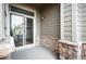 Private patio with sliding glass door access at 12826 W Brittany Dr, Littleton, CO 80127