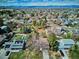 An aerial view of the neighborhood on a sunny day with mountain views at 13183 Spica Dr, Lone Tree, CO 80124
