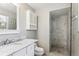 Elegant bathroom with marble countertop vanity and a glass-enclosed marble shower at 13183 Spica Dr, Lone Tree, CO 80124