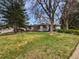 Lovely home with mature trees and a well-maintained lawn at 2900 S Downing St, Englewood, CO 80113