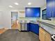 This updated kitchen features sleek stainless steel appliances, modern cabinetry, and neutral walls at 2900 S Downing St, Englewood, CO 80113