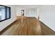This spacious living room has gleaming hardwood floors and a built-in bookcase, ready for your personal touch at 2900 S Downing St, Englewood, CO 80113