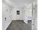 Bright room featuring a tiled floor, multiple doors, and neutral paint at 2900 S Downing St, Englewood, CO 80113