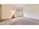 Bright carpeted bedroom with ample natural light and neutral walls at 13940 E Linvale Pl, Aurora, CO 80014