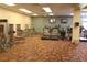 Spacious gym with a variety of Cybex weight machines, treadmills, and televisions for entertainment at 13940 E Linvale Pl, Aurora, CO 80014