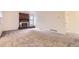 Spacious living room with a fireplace and neutral carpeting at 13940 E Linvale Pl, Aurora, CO 80014