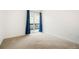 Bright bedroom with sliding glass doors leading to the outdoors at 3452 S Eagle St # 101, Aurora, CO 80014