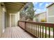Outdoor deck with views of green trees at 3452 S Eagle St # 101, Aurora, CO 80014