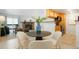 Open living space combining living room, dining area, and kitchen, perfect for entertaining and daily living at 3452 S Eagle St # 101, Aurora, CO 80014