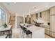 Spacious kitchen with a large island and modern appliances at 2313 S High St, Denver, CO 80210