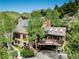 Mountain home with stone accents, large deck, and stunning views at 34127 Cactus Dr, Evergreen, CO 80439