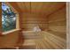 Inviting sauna with light wood interiors, offering a relaxing experience with scenic views at 34127 Cactus Dr, Evergreen, CO 80439