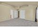 An interior view of a bedroom with a large closet at 1356 Carlyle Park Cir, Highlands Ranch, CO 80129
