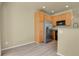 Cozy kitchen featuring stainless steel appliances and wood cabinets at 1356 Carlyle Park Cir, Highlands Ranch, CO 80129