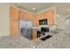 Kitchen features granite countertops and stainless steel appliances at 1356 Carlyle Park Cir, Highlands Ranch, CO 80129
