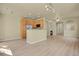 Open-concept living and kitchen space with a ceiling fan and bright neutral walls at 1356 Carlyle Park Cir, Highlands Ranch, CO 80129