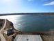 Picturesque lake view with a basketball court and walking trail for recreation and enjoyment at 715 Mockingbird St, Brighton, CO 80601
