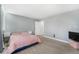 Bright bedroom featuring ample natural light and a large space for relaxation at 715 Mockingbird St, Brighton, CO 80601