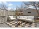 Outdoor deck featuring a decorative rug, lounge furniture, and a fire pit for cozy evenings at 764 S Corona St, Denver, CO 80209