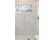 Elegant shower area with white subway tile and a modern shower head at 764 S Corona St, Denver, CO 80209