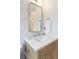 Bathroom vanity with a rectangular mirror and white countertop at 764 S Corona St, Denver, CO 80209