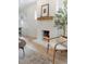 Charming fireplace with brick surround and decorative mantel, adding warmth to the living space at 764 S Corona St, Denver, CO 80209