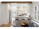Stylish kitchen featuring stainless steel appliances, quartz countertops, and modern cabinetry at 764 S Corona St, Denver, CO 80209