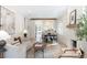 Bright and airy living room with hardwood floors, a cozy fireplace, and an open layout at 764 S Corona St, Denver, CO 80209