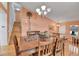 Open dining area with hardwood floors and natural light from windows at 20948 E Hamilton Ave, Aurora, CO 80013