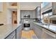 Modern kitchen featuring stainless steel appliances and granite countertops at 20948 E Hamilton Ave, Aurora, CO 80013
