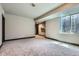 Spacious basement with carpet flooring and window with a backyard view at 23774 E 36Th Pl, Aurora, CO 80019