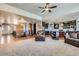 Expansive living area with open floor plan, fireplace, and seamless flow to the kitchen at 23774 E 36Th Pl, Aurora, CO 80019