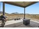 Covered patio with concrete flooring, a grill, and a firepit at 23774 E 36Th Pl, Aurora, CO 80019