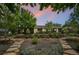 Inviting home with mature trees, manicured landscaping, and a serene ambiance at 3519 S Holly St, Denver, CO 80237