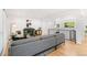 Cozy living room with a fireplace, hardwood floors, and modern furnishings at 3519 S Holly St, Denver, CO 80237
