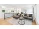 Modern living room with stylish furniture, open floor plan, and natural light at 3519 S Holly St, Denver, CO 80237