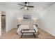 Cozy bedroom features neutral tones, soft lighting, and comfortable furnishings at 544 Vance St, Lakewood, CO 80226