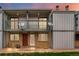 Charming townhouse featuring a brick facade, balcony, and updated exterior at 544 Vance St, Lakewood, CO 80226