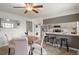 Modern kitchen with stainless steel appliances and a breakfast bar with seating at 544 Vance St, Lakewood, CO 80226