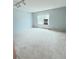 Light-filled bedroom boasts soft carpeting, a bright window, and recessed lighting for a cozy retreat at 3415 S Ammons St # 24-2, Lakewood, CO 80227