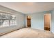 Spacious bedroom with ample natural light from a large window and generous closet space at 3415 S Ammons St # 24-2, Lakewood, CO 80227