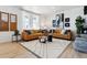 Stylish living room featuring contemporary furniture, creating an inviting space for relaxation and socializing at 673 N Tempe St, Aurora, CO 80018
