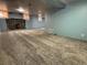 Expansive basement with stone fireplace and ample room for recreation and storage at 3024 W Denver Pl, Denver, CO 80211