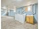 Finished basement includes laundry area with washer, dryer, sink, and carpeted floors at 3024 W Denver Pl, Denver, CO 80211