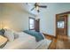 A bedroom with hardwood floors and a ceiling fan at 3024 W Denver Pl, Denver, CO 80211