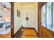 An entryway with hardwood floors and views to the bedroom at 3024 W Denver Pl, Denver, CO 80211