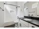 Updated bathroom offers a shower with white subway tile and black hardware at 5310 Craftsman Dr, Parker, CO 80134