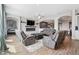 Spacious living room with stone fireplace and cozy seating area at 5310 Craftsman Dr, Parker, CO 80134