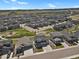 Neighborhood aerial showcasing picturesque community with well-manicured lawns and houses at 5166 Trails Edge Ln, Castle Rock, CO 80104